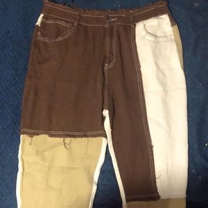 Cut and Sew Raw Hem jeans. Multi-colored.